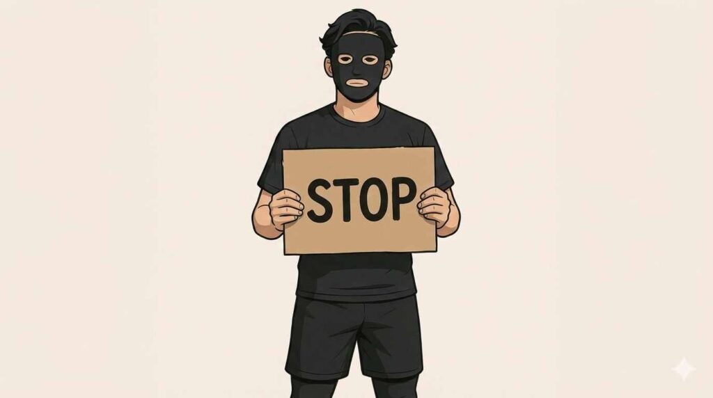 STOPの看板を持つブラック太郎